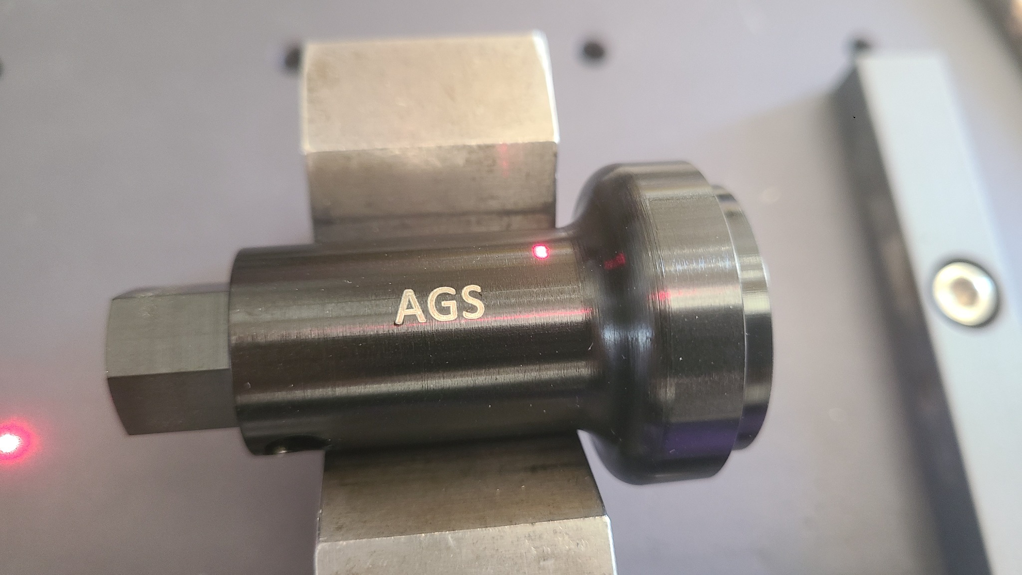 Laser marking on a black anodized aluminum component